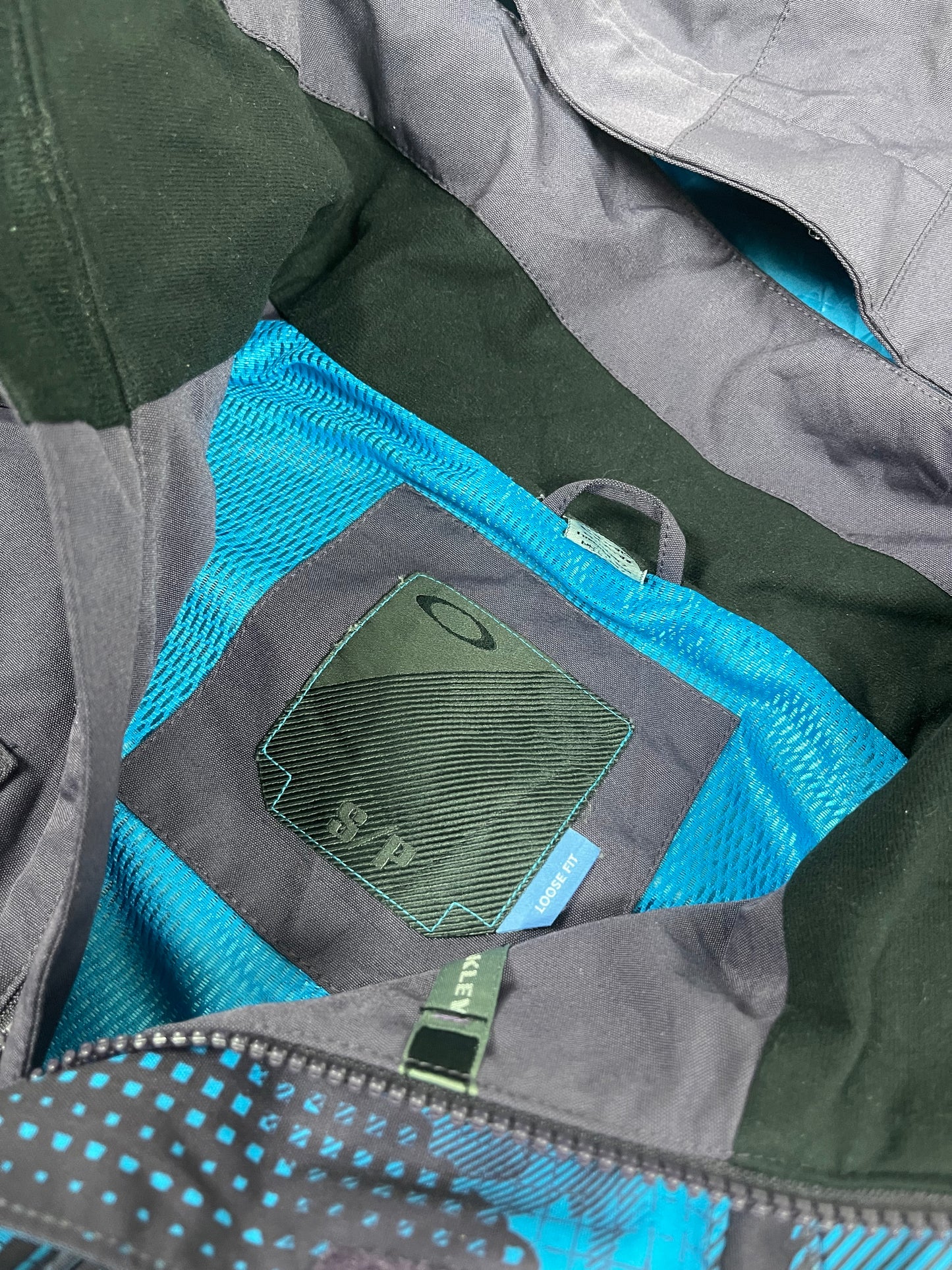 Oakley rainjacket (L)